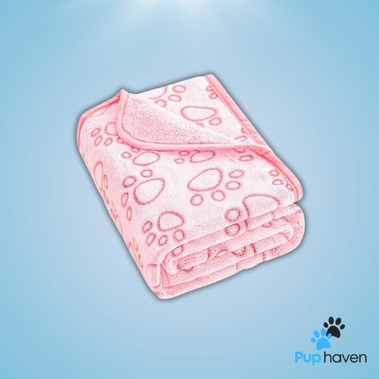 Ultra-soft cozy paw print pet blanket for dogs, made with premium coral fleece.