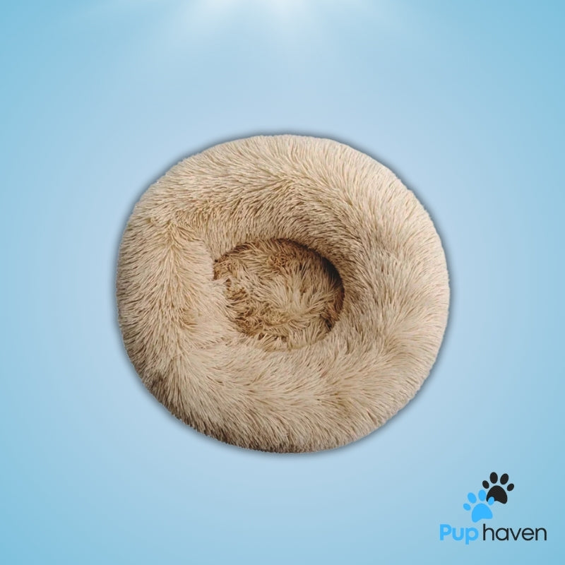 Apricot Cozy plush round pet bed for dogs and cats, offering warmth and ultimate comfort.