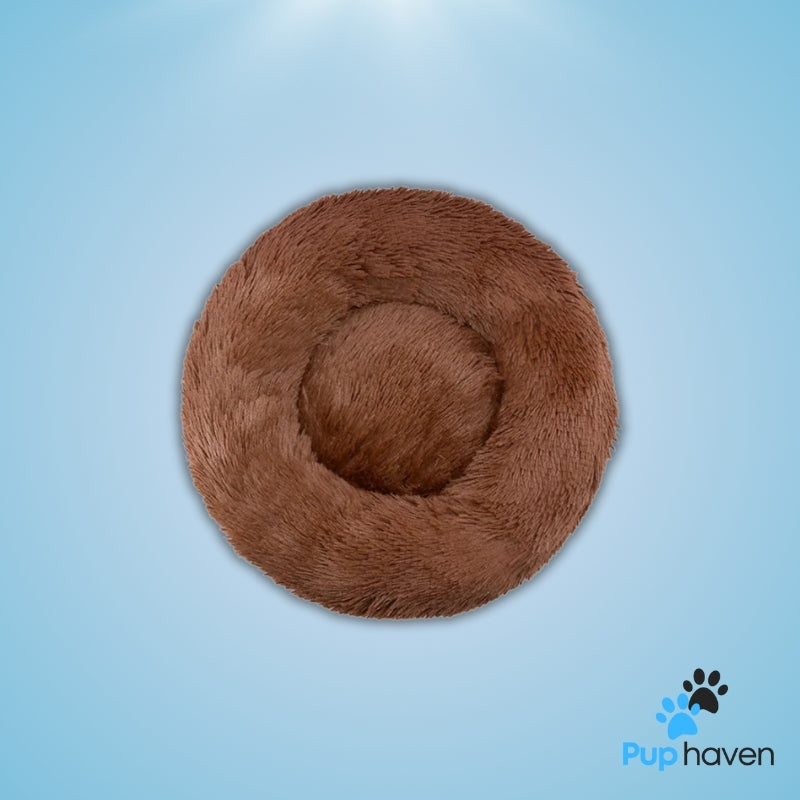 Brown Cozy plush round pet bed for dogs and cats, offering warmth and ultimate comfort.