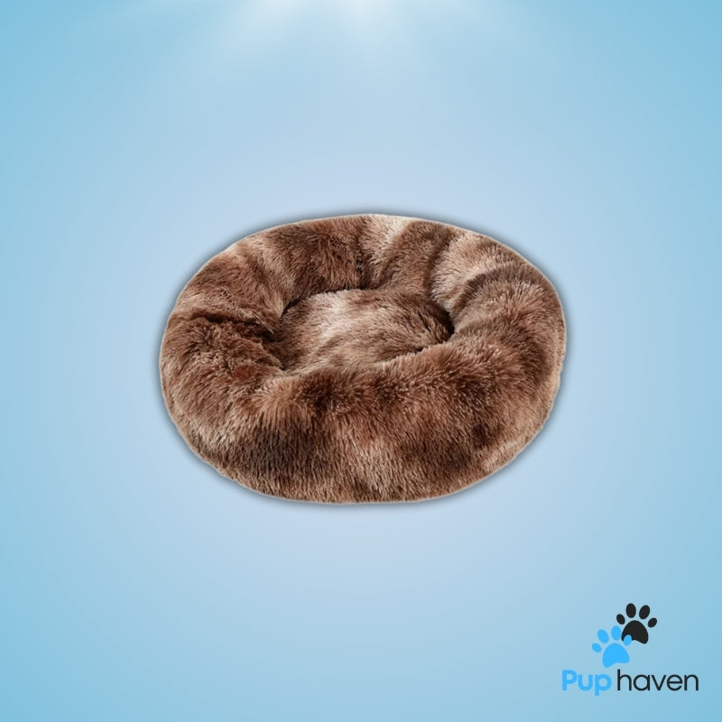 Cozy plush round pet bed for dogs and cats, offering warmth and ultimate comfort.