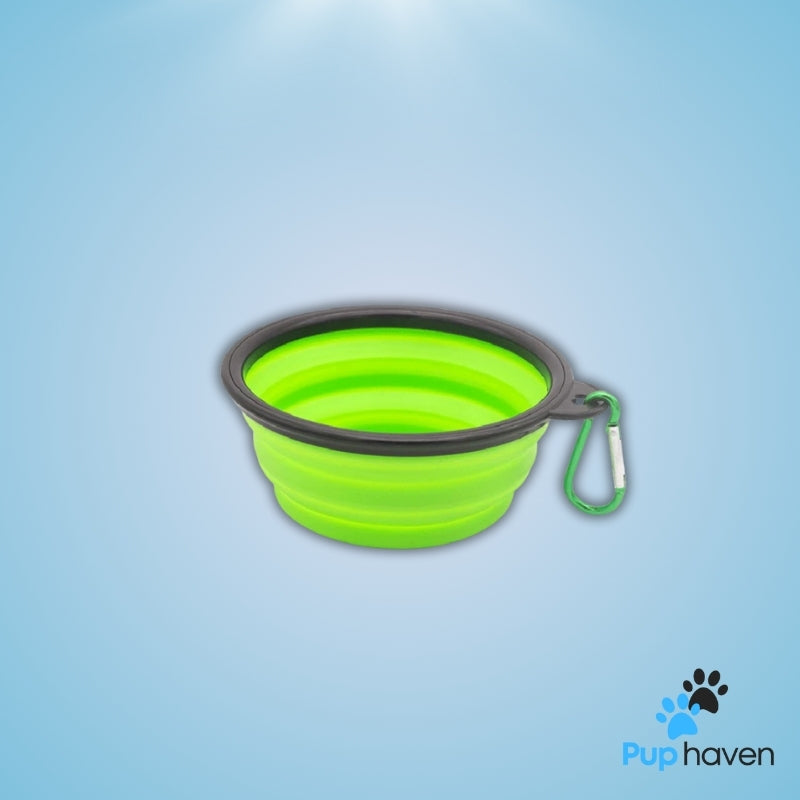 Green Folding portable silicone pet bowl for food and water, ideal for travel and outdoor activities.