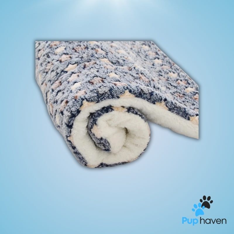Plush and cozy sleeping mat designed for pets of all sizes, offering comfort and support during relaxation time.